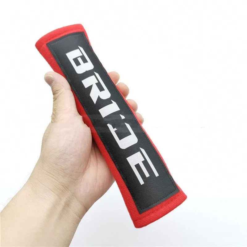 Car safety belt shoulder pads in black, blue and red with cotton sponge cloth and embroidery detailing