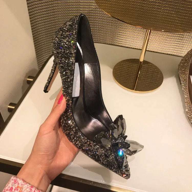 Women's gold pointed toe stiletto heels with sequin cloth upper and rhinestone decoration