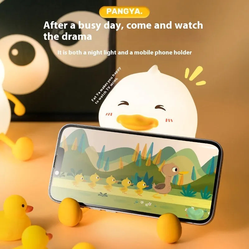 Chubby silicone night lamp with phone holder showing dimensions 108x104x128mm