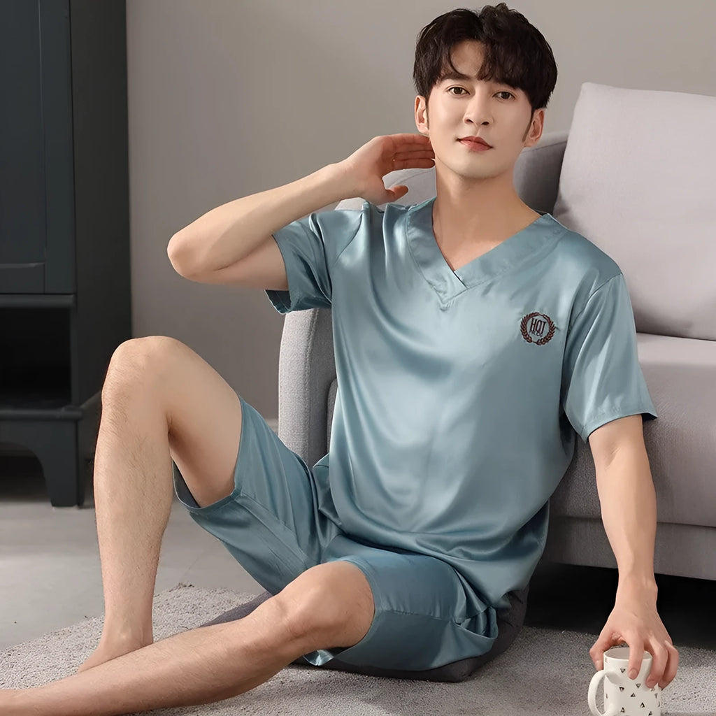 Man's ice silk pajama set showing loose short sleeve shirt and matching shorts in a solid colour.