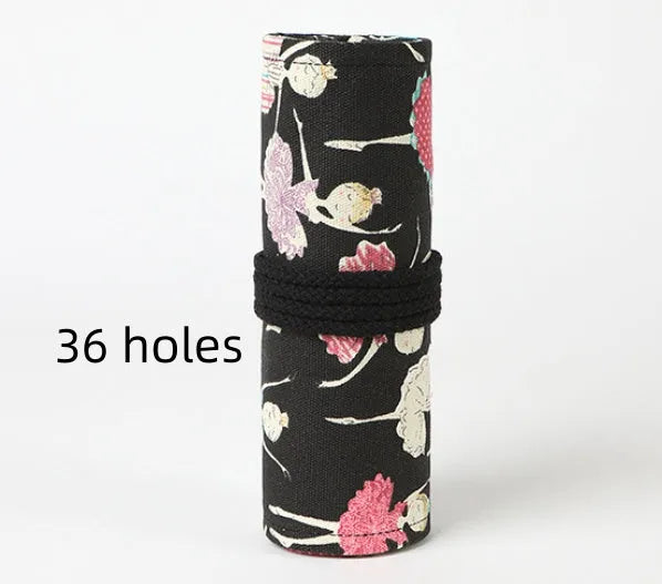 Square canvas rolling pencil case with ballet girl print, unrolled to show multiple pencil holes.
