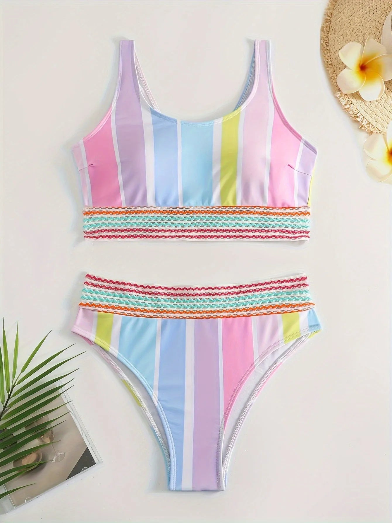 Women's striped sport bikini set with briefs style top and pants for swimming.