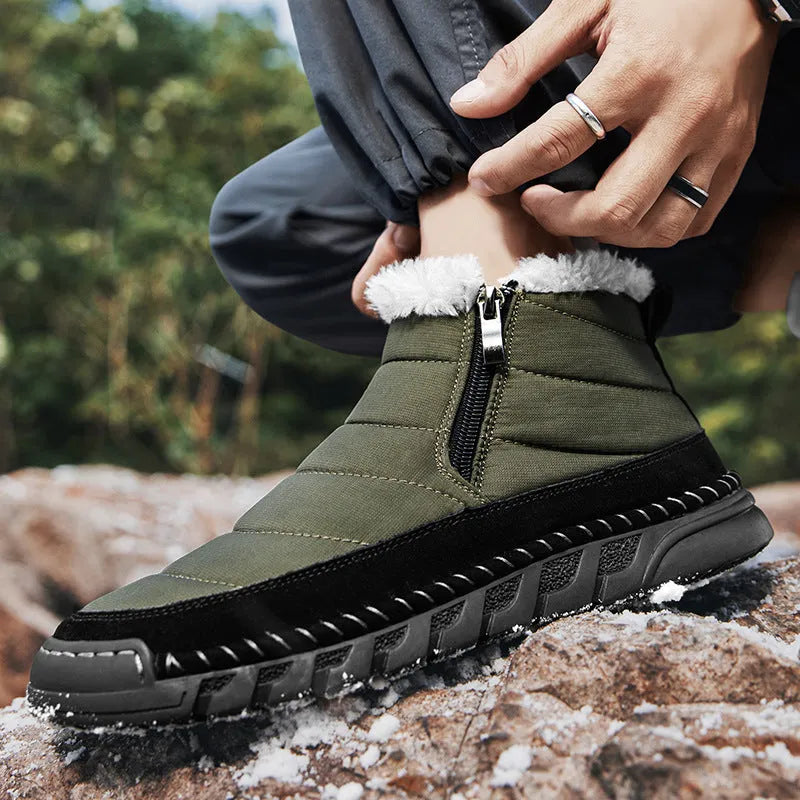 Men's plus size snow boot in blue with round toe, flat heel, and non-slip rubber sole