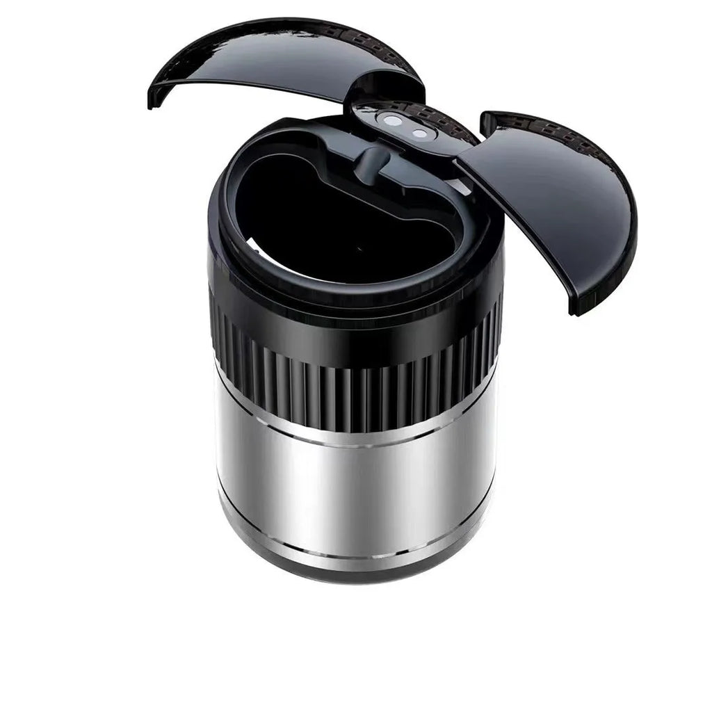 Automatic infrared sensing car ashtray in black metal with lid and charging cable.