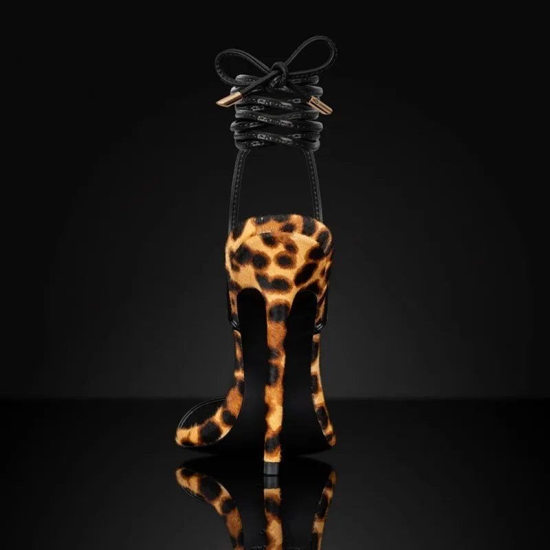 Women's leopard print Roman sandals with pointed toe and lace-up fastening on rubber sole