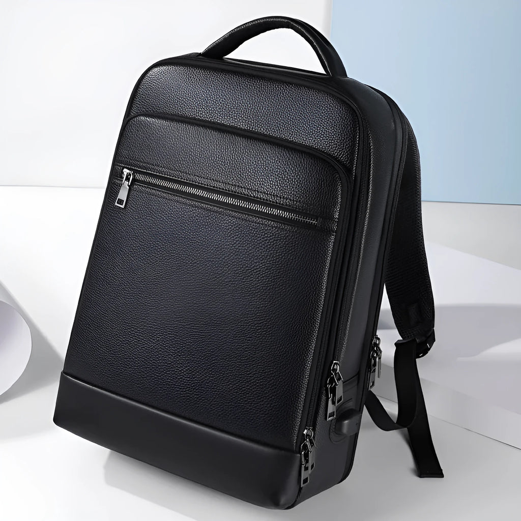 Black genuine leather men's business laptop backpack with curved shoulder straps and visible sewing details