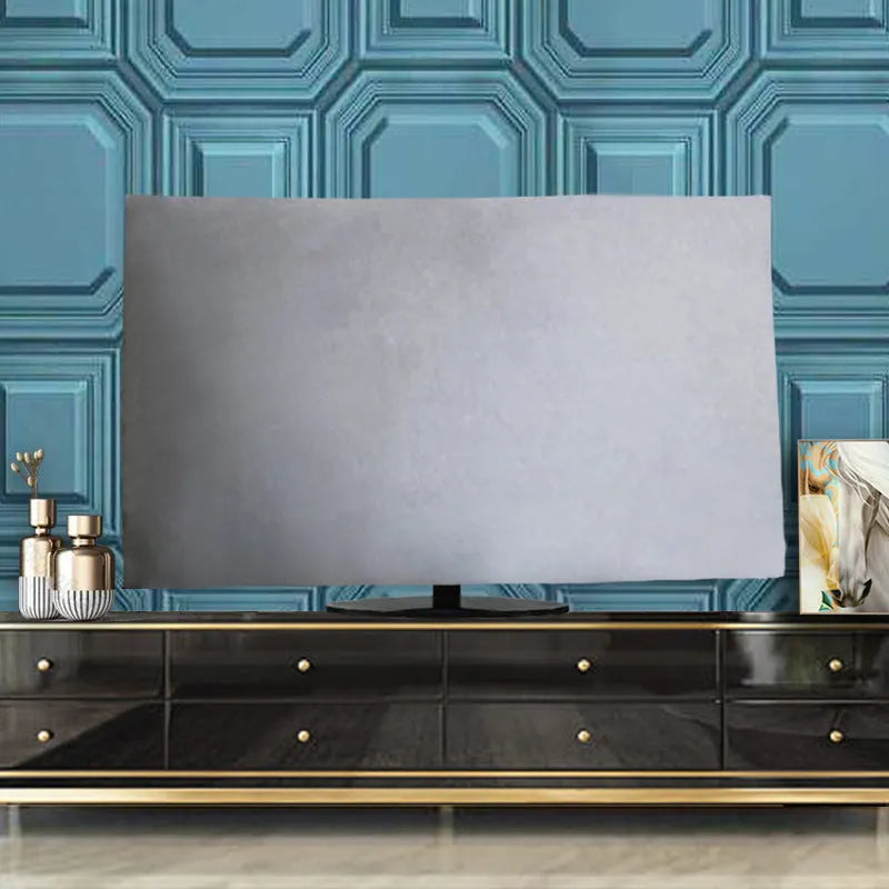 Velvet fabric TV dust cover in light blue colour, shown draped over a television