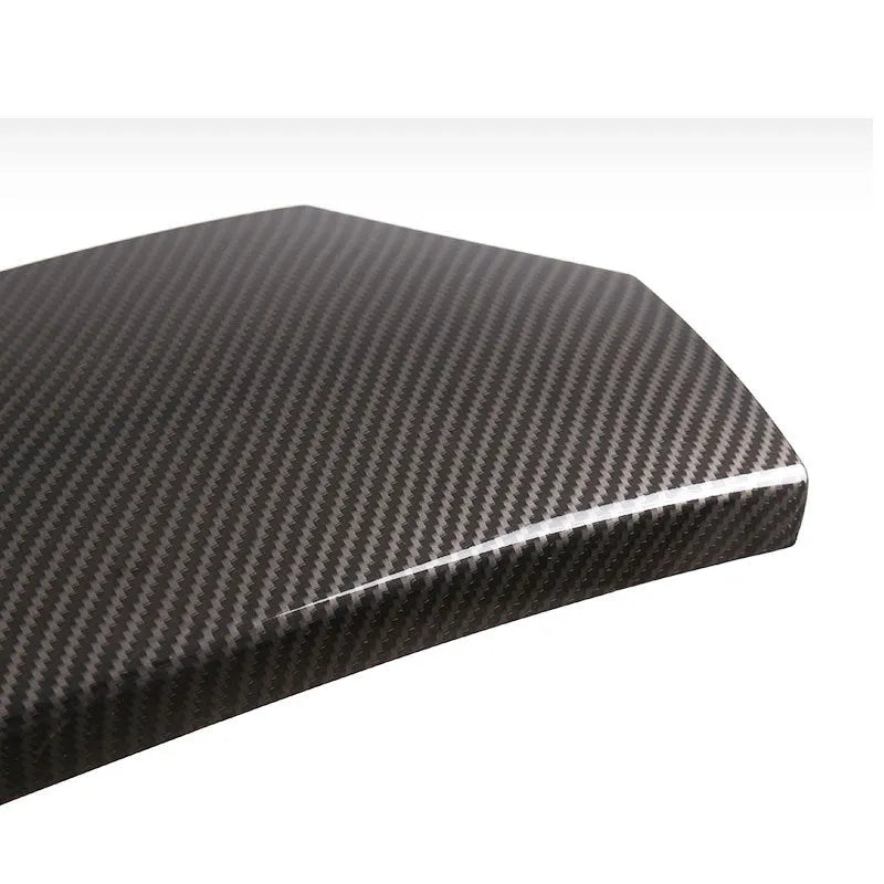 Three black ABS armrest box protective covers with carbon fibre pattern for car centre console