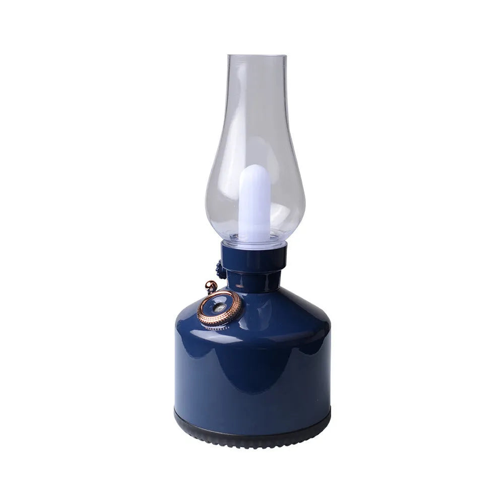 Kerosene lamp ultrasonic humidifier and aroma diffuser with ABS shell in brass color on a table