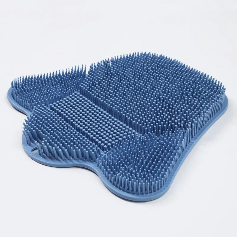 Blue silicone bath brush cushion mat for skin scrubbing measuring 31cm by 32cm