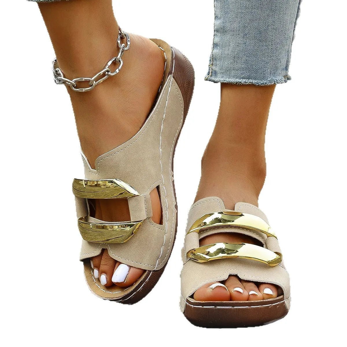 Pair of Roman-style platform flip-flop sandals on a solid colour background.