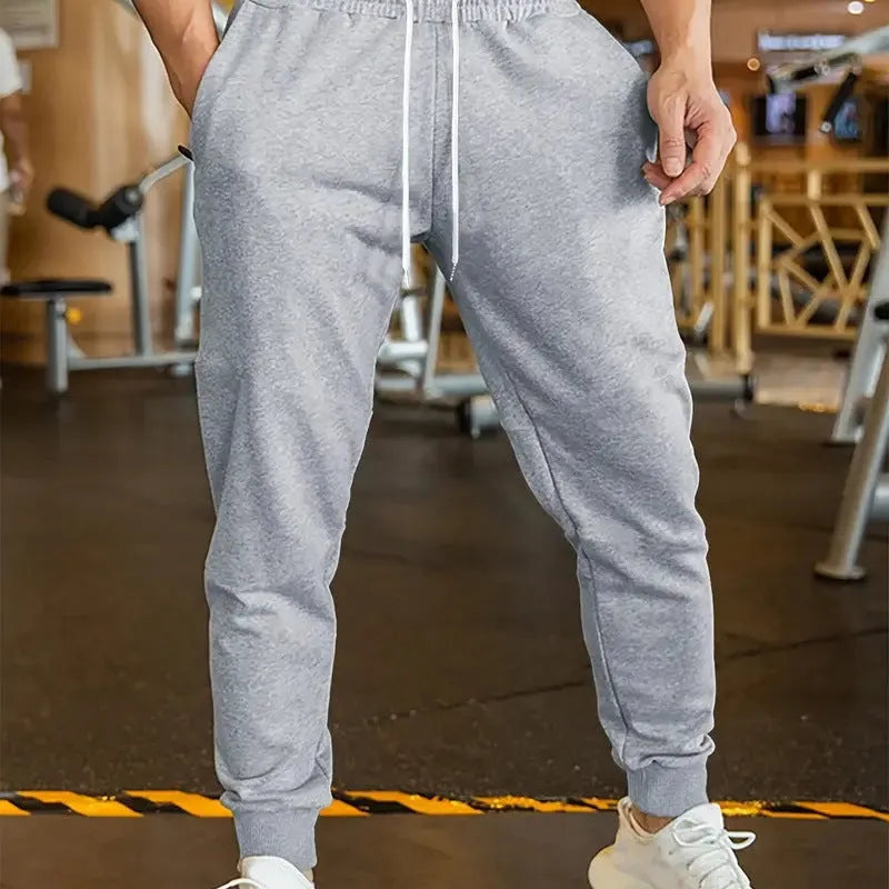 Men's linen leisure trousers with elastic waist and drawstring in loose fit casual style