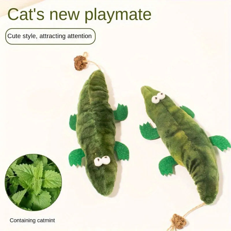 Green alligator-shaped cat toy with catnip and peppermint scent for oral cleansing