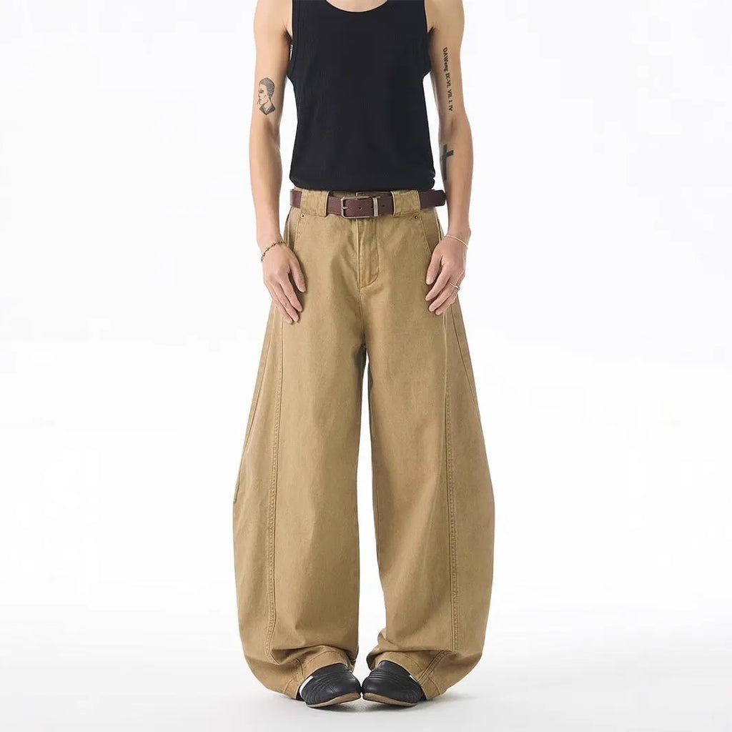 Mid-brown men's straight-leg casual jeans with a button fly on a mid-waist.