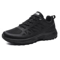 Men's black and orange outdoor running shoes with mesh upper and lace-up front.