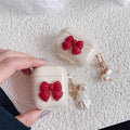 Beige red bow shell wireless earphone case for AirPods models with TPU clamshell design