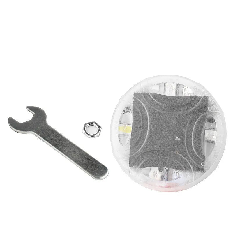 Colourful solar-powered LED decorative light for mounting on a vehicle wheel hub