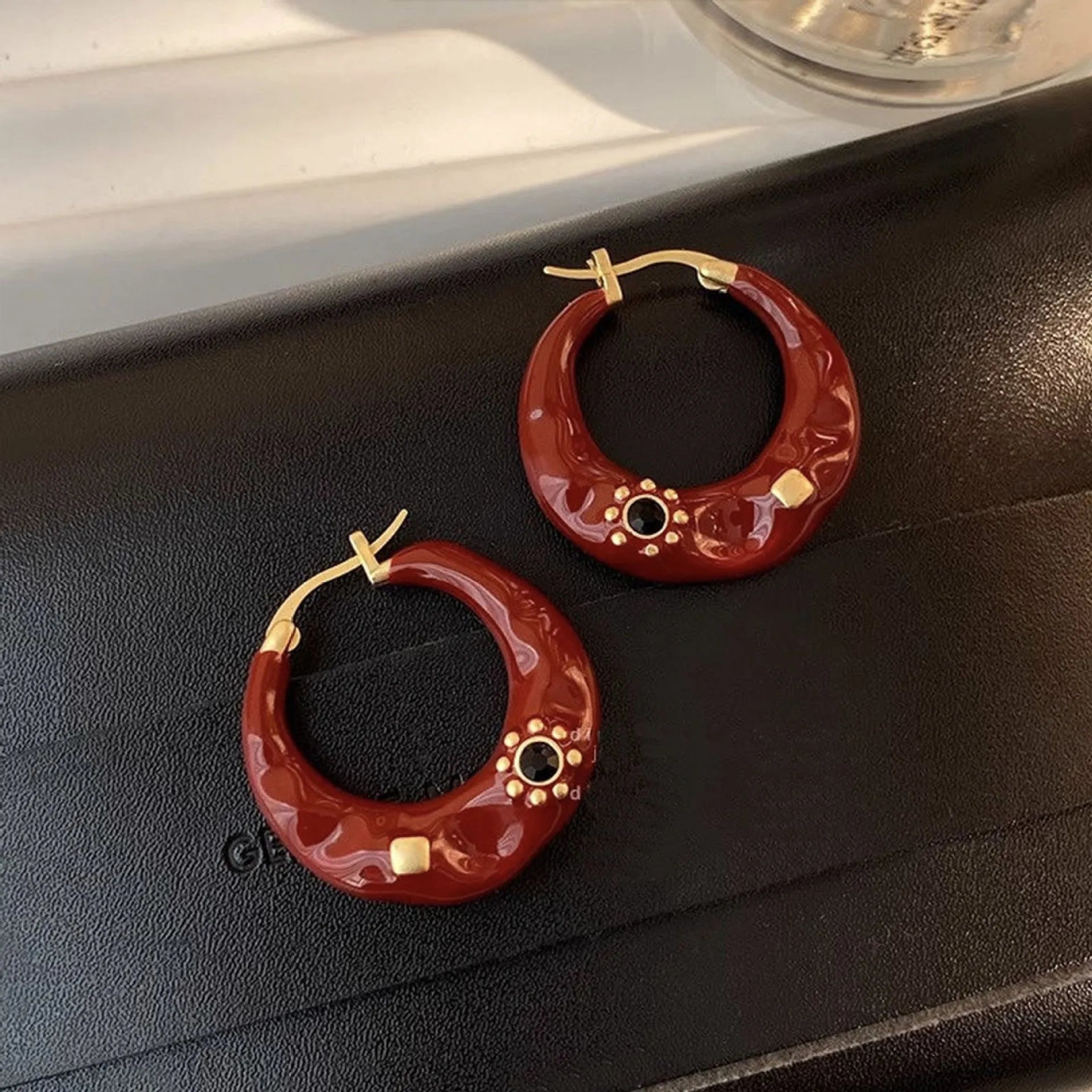 Hong Kong style retro ear studs with dripping oil treatment and rhinestone detail