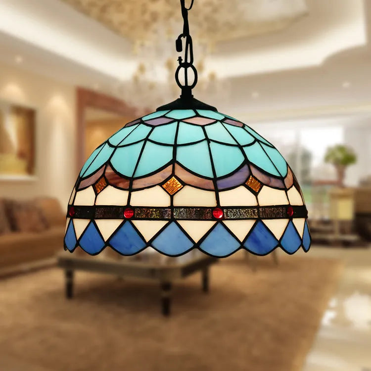 European baroque style chandelier with a coloured glaze finish and abstract design.