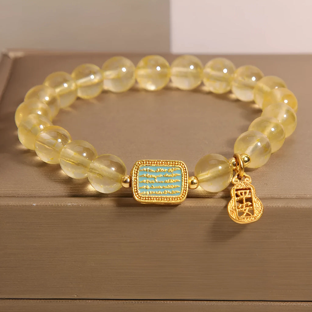 Women's natural yellow crystal bracelet with citrine colour and rhinestone detailing