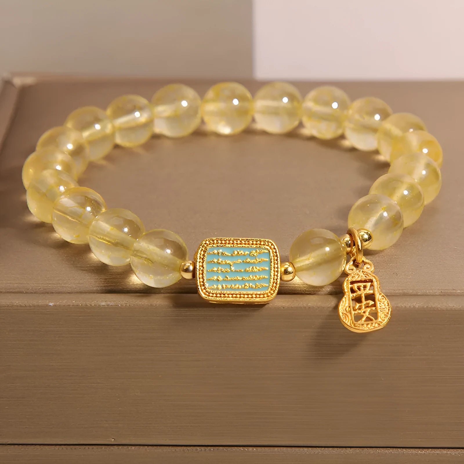 Women's natural yellow crystal bracelet with citrine colour and rhinestone detailing