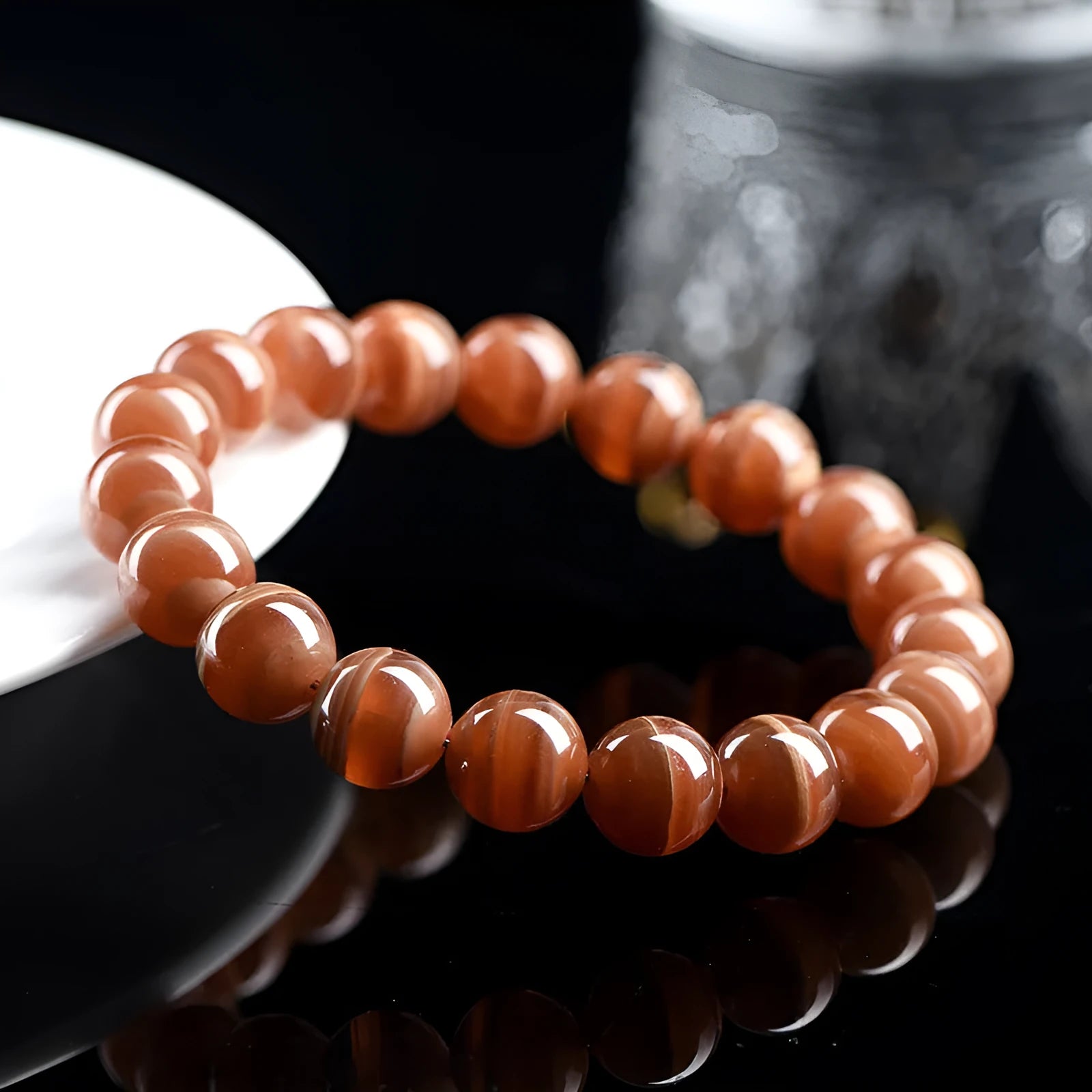 Natural old mine rhodochrosite round beads bracelet with Ruyi design element