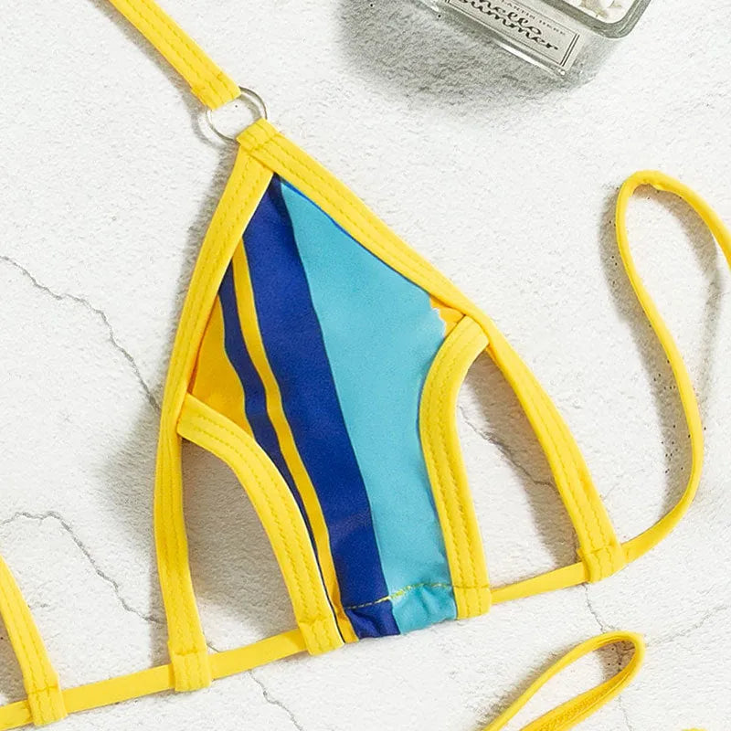 Yellow women's split swimsuit with hollow design and neck-hanging style