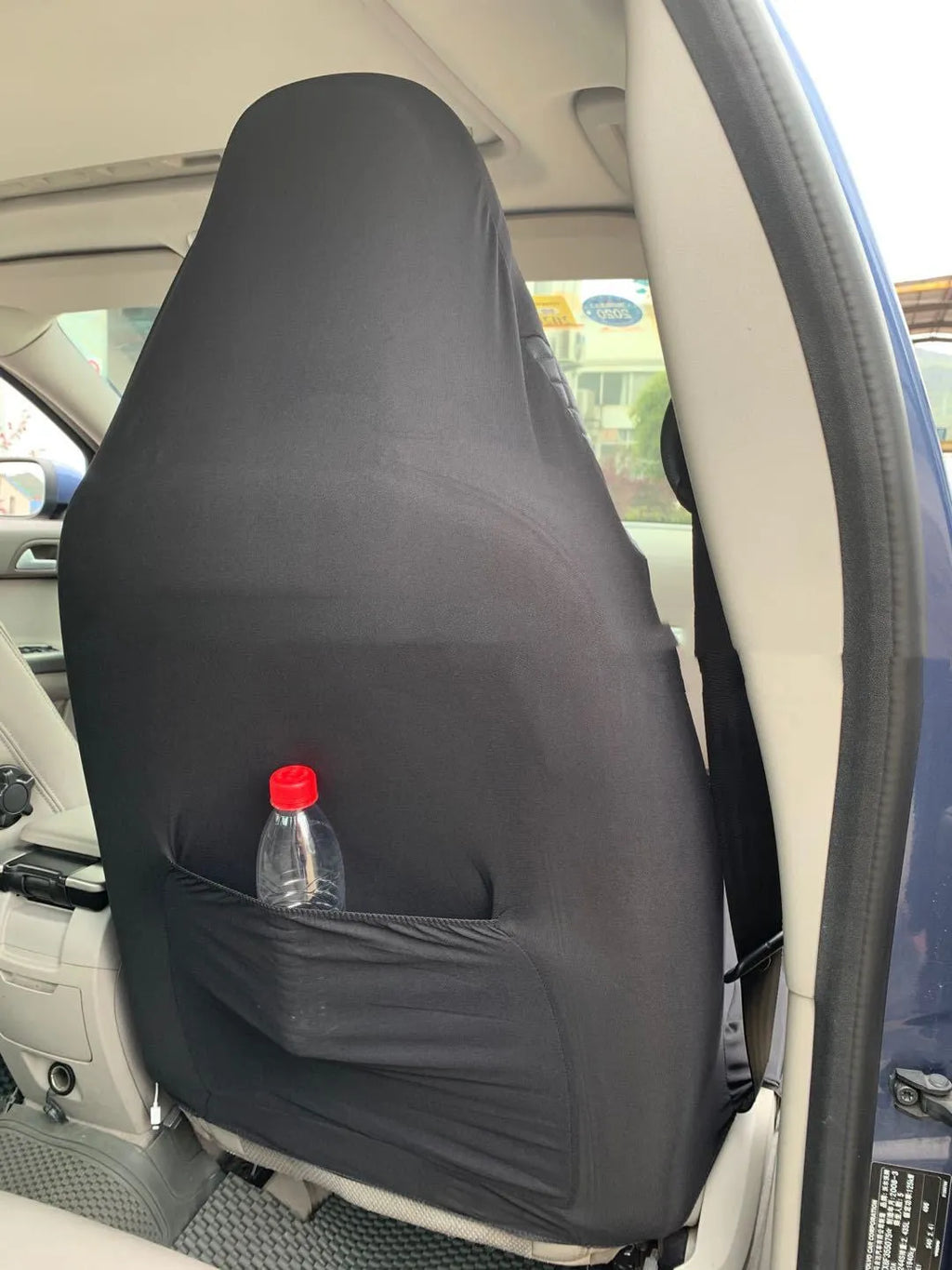 Black quilted automotive seat cover with PU polyester fabric and plastic hooks for universal car seat protection