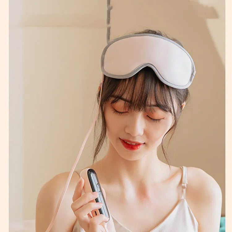 Portable Eye SPA Mask with suede shell in pink or green, showing USB port and dimensions of 93mm by 200mm.