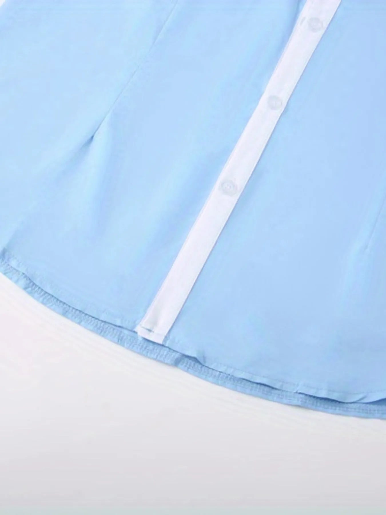 Blue long-sleeved business shirt for teenagers with white contrast collar and cuffs