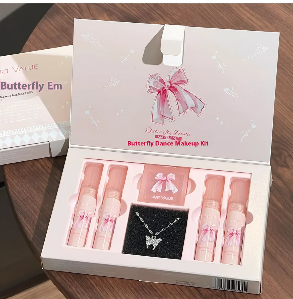 Butterfly box makeup set containing four matte lip muds, powder blusher, and coordinating necklace