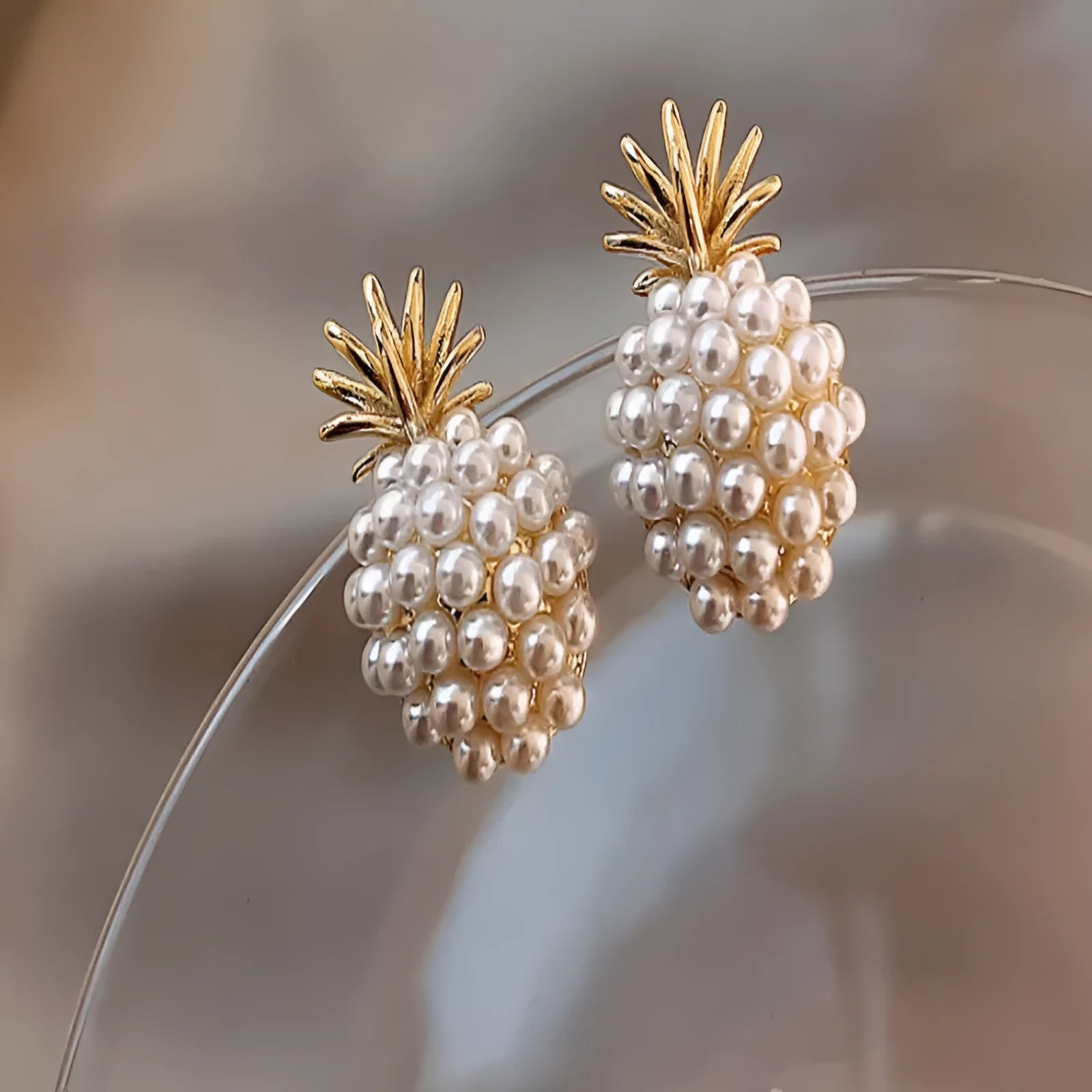 Korean-style pineapple starfish pearl earrings in alloy with electroplated metallic finishes