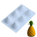Set of six silicone fruit baking moulds showing pineapple and pine cone shapes