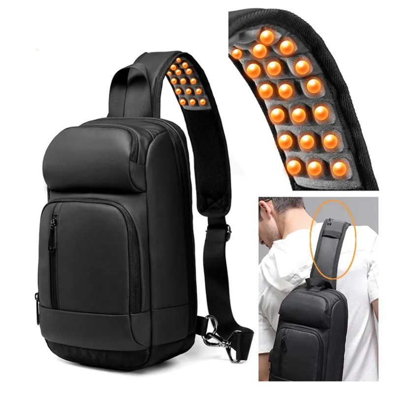 Black PVC outdoor shoulder bag with a square shape, showing the air cushion strap and front pocket.