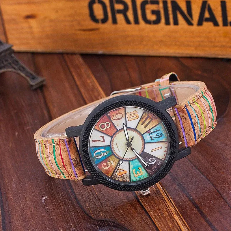 Casual women's wrist watch with leather strap showing 37mm round dial and stainless steel buckle