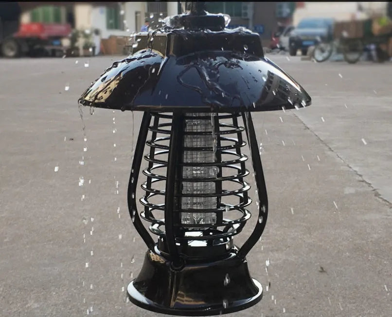 Black solar-powered mosquito lamp with solar panel and LED lights for garden insect control