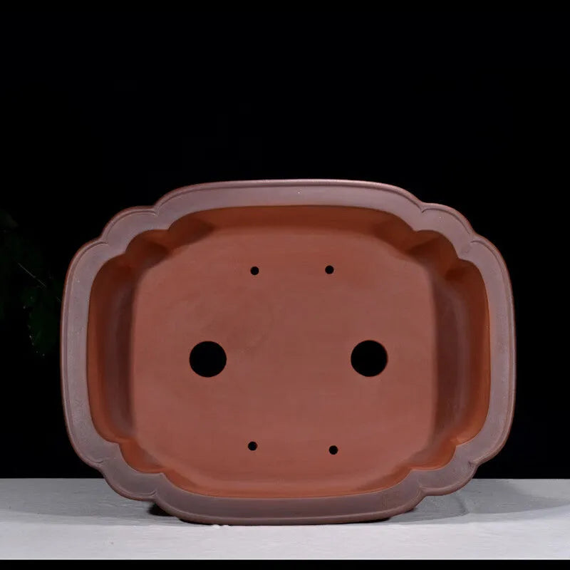 Large antique-finished Chinese purple clay flowerpot measuring 71cm long