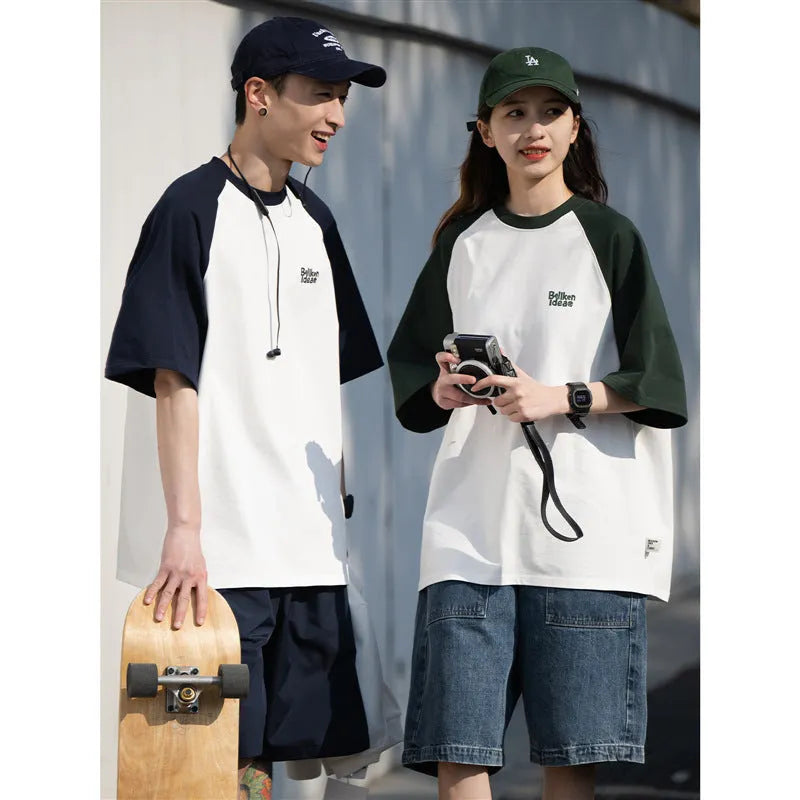 Men's blue Japanese junior style raglan sleeve t-shirt with loose fit on hanger