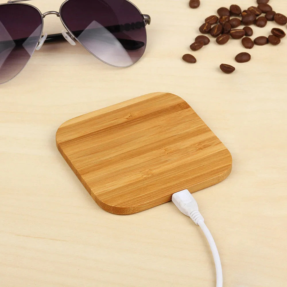 Square brown wooden bamboo 5W Qi wireless charging pad showing dimensions.