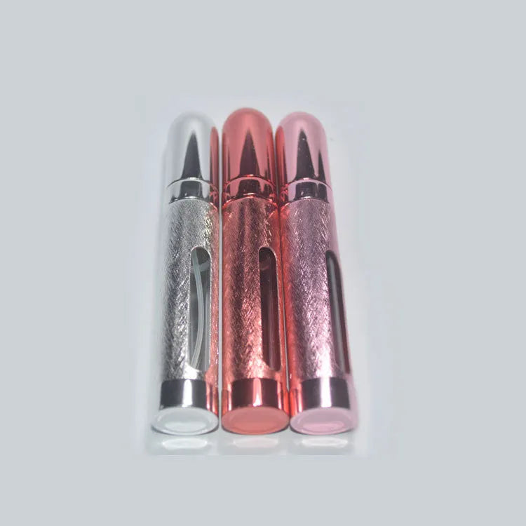 Slim 12ml aluminium bullet-style travel perfume atomiser bottle in a choice of metallic colours.