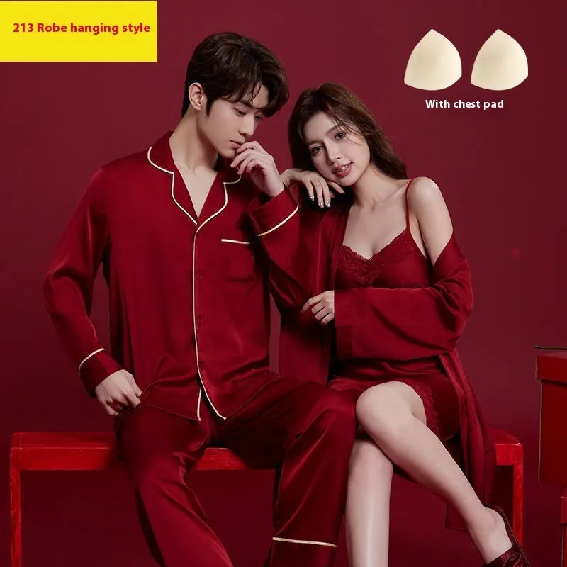 Red long-sleeve ice silk sleepwear set for a man and woman on hangers.