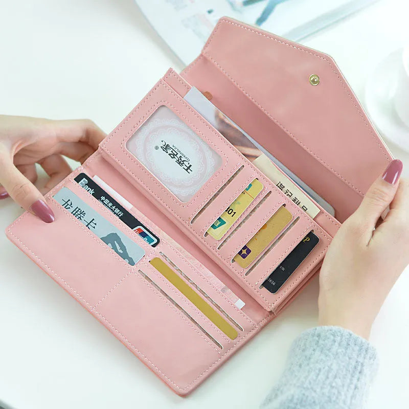 Women's three-fold PU leather wallet with buckle closure in multiple colours