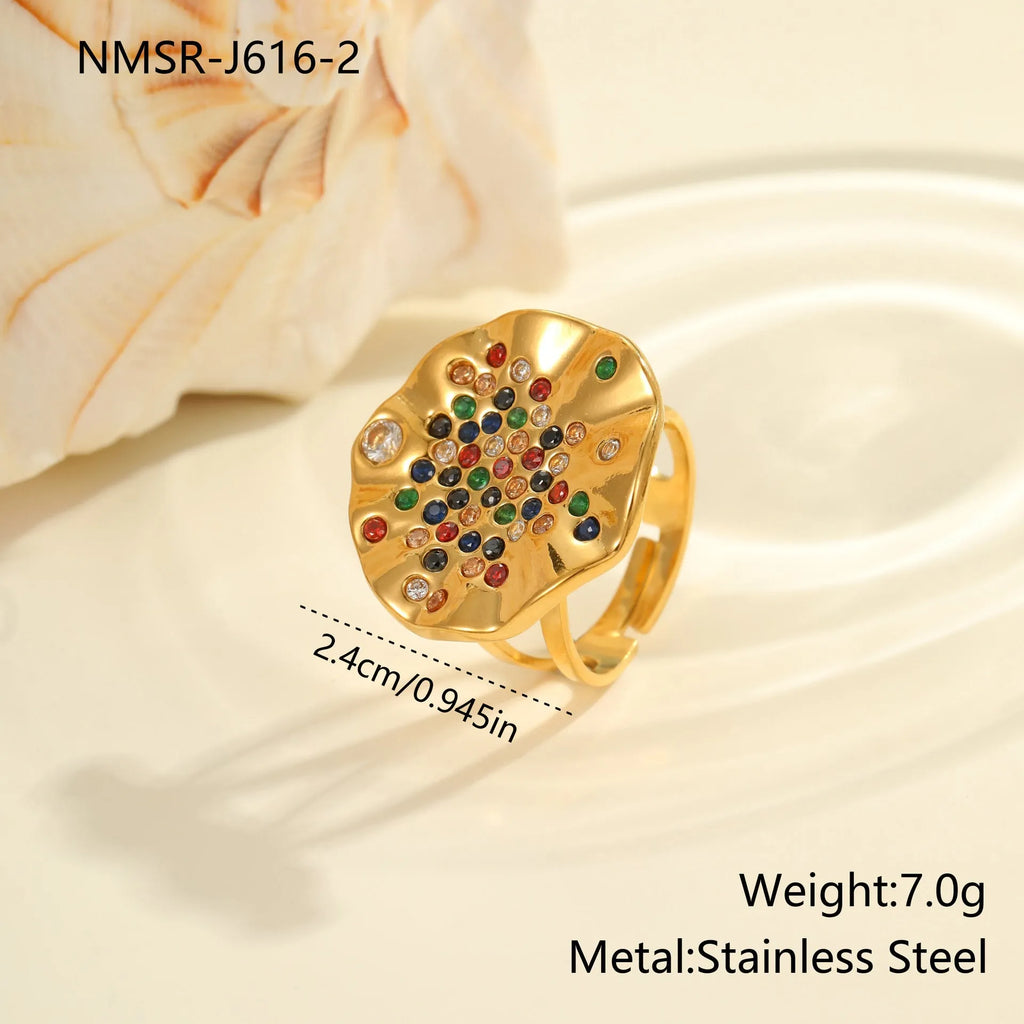Geometric stainless steel ring with colourful crystal inlays and adjustable open mouth design