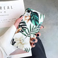 Green banana leaf floral pattern TPU phone case for iPhone on wooden surface