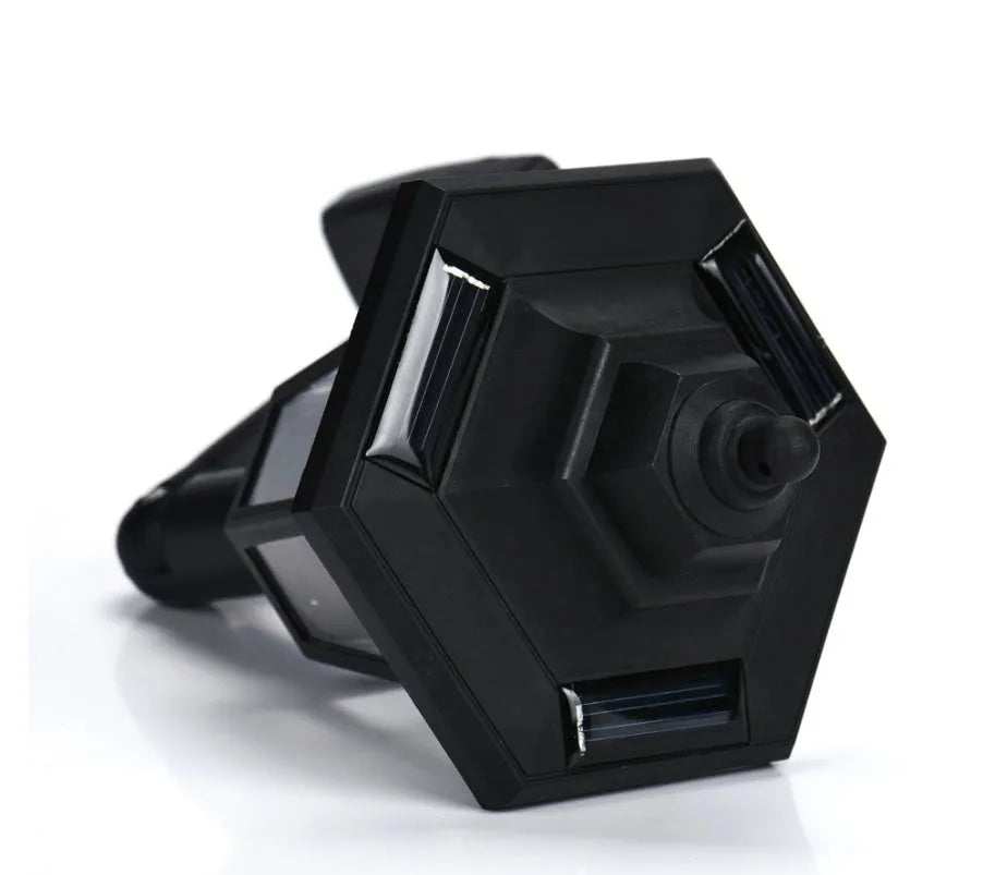 Black hexagonal solar wall lamp with integrated solar panel for outdoor garden or patio lighting