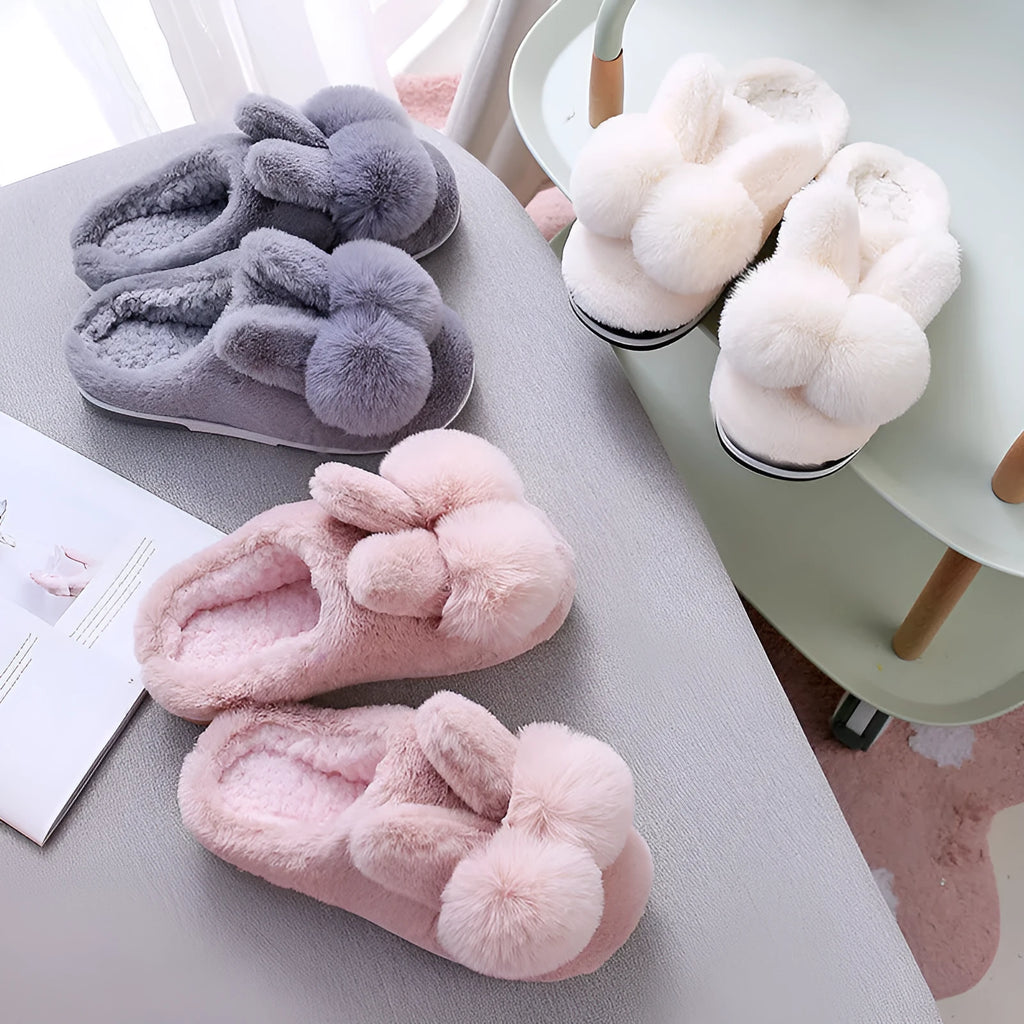 Women's high-top fluffy rabbit fur slippers with floral details in creamy white colour.