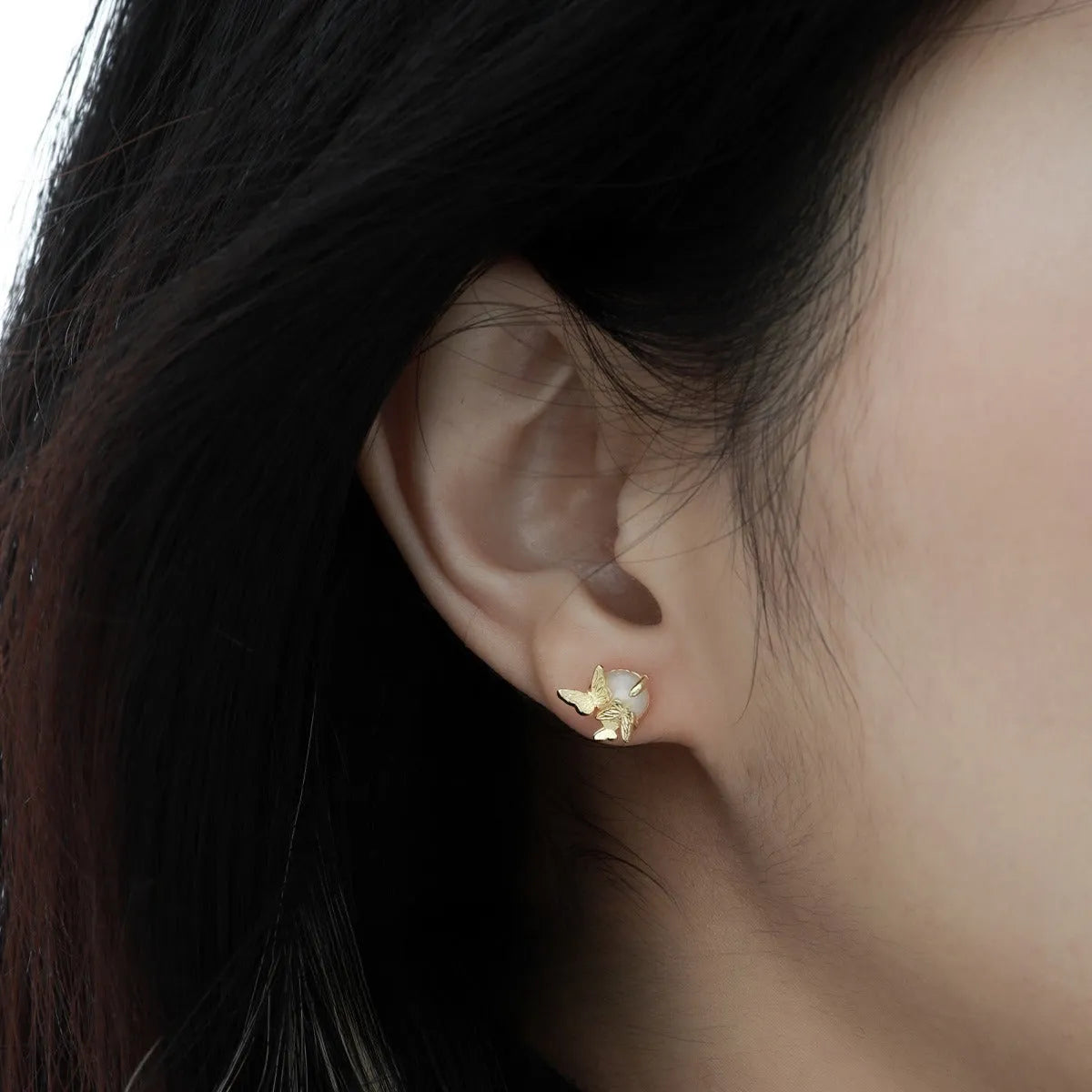 Butterfly ear studs in 925 silver with electroplated white gold or gold colour and original design