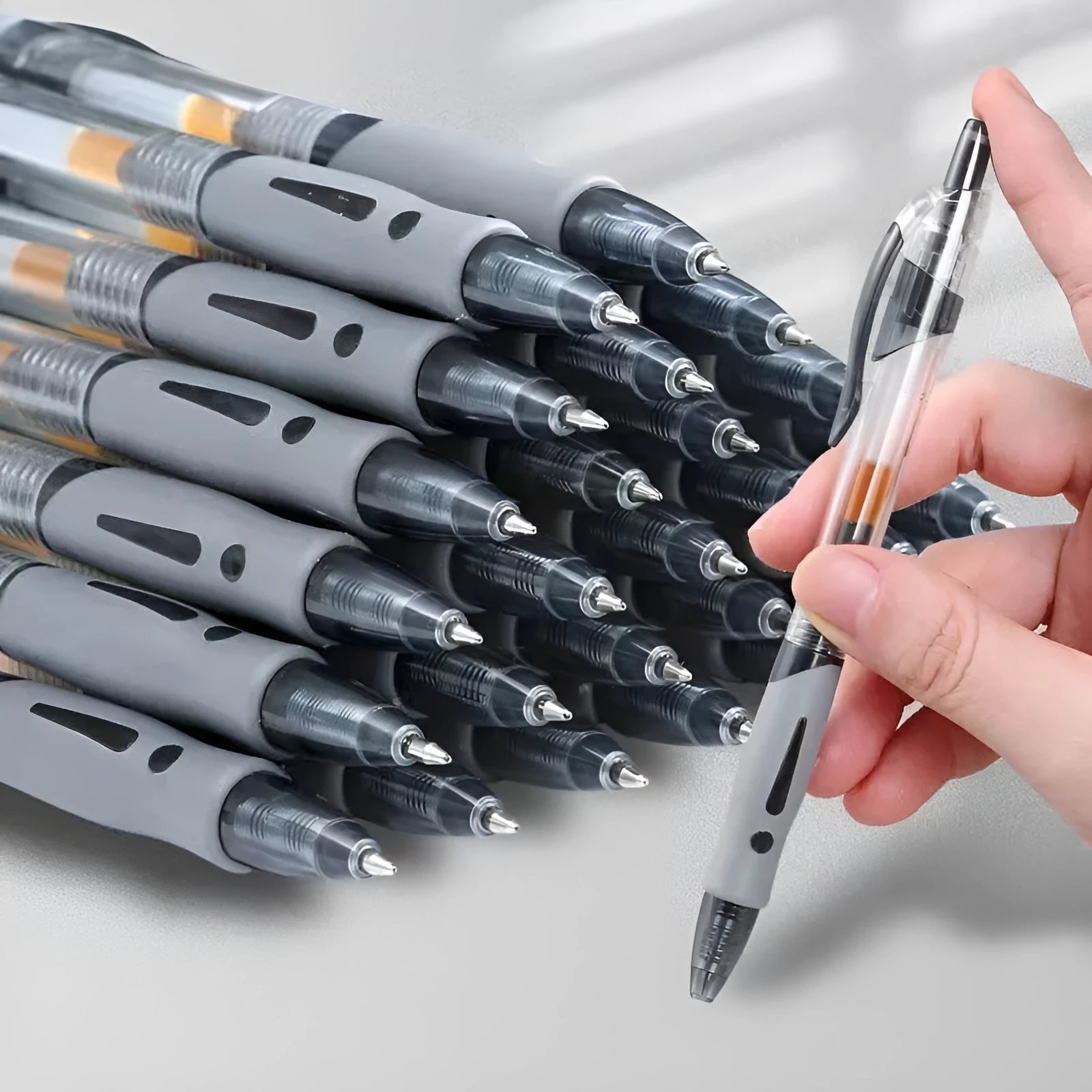 0.5mm fine tip gel pen in plastic construction with black, blue, and red ink colour options