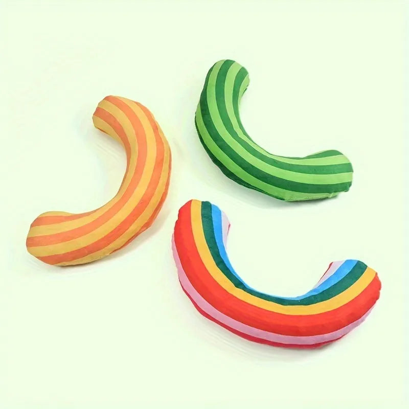 Striped green, rainbow, and yellow cat pillow toys with a built-in catnip strip and noise maker.
