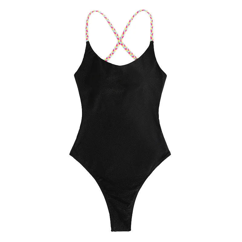 Black solid colour one-piece swimsuit with a backless and sleeveless design on a mannequin.